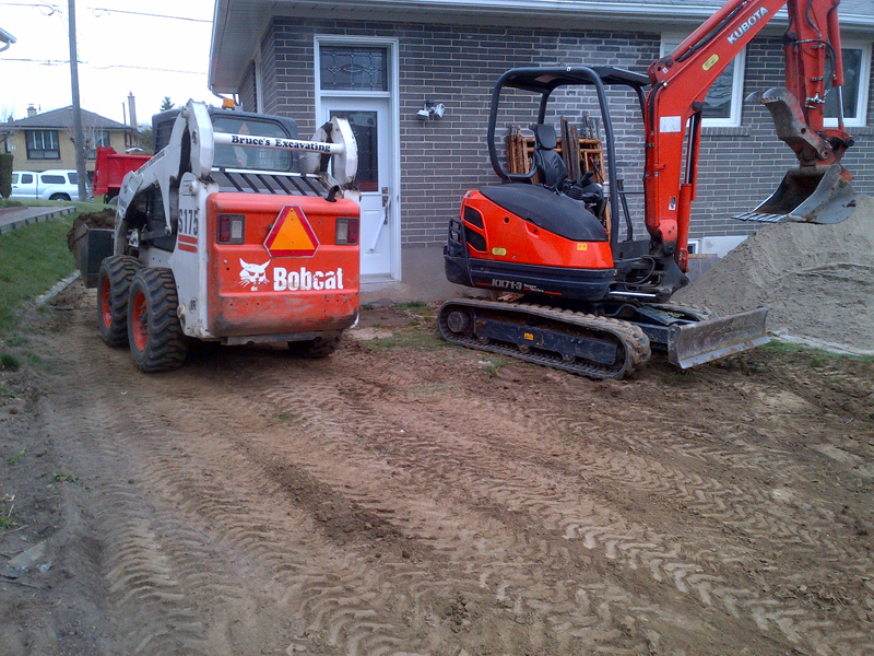 Bruce's Excavating heavy equipment on site